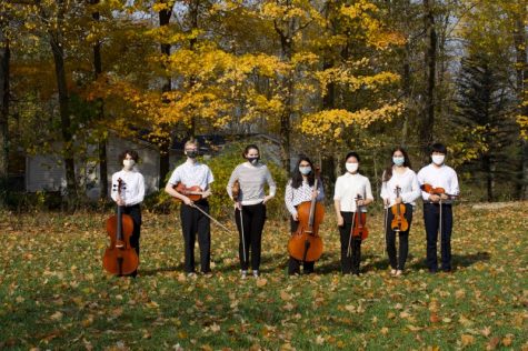 orchestra vivace outside with instruments