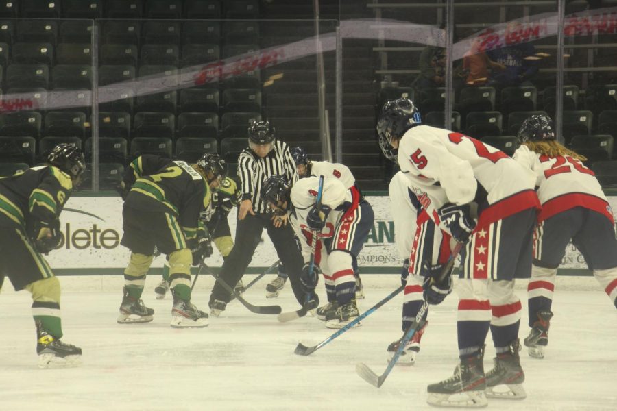 High school conglomerate hockey team narrowly misses MHSAA quarterfinal after six OT loss in Regional Final