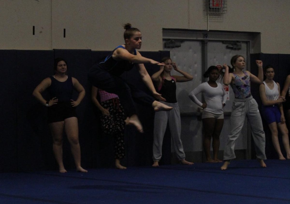 Sarah+Bollman+%2812%29+performs+a+jump+during+practice
