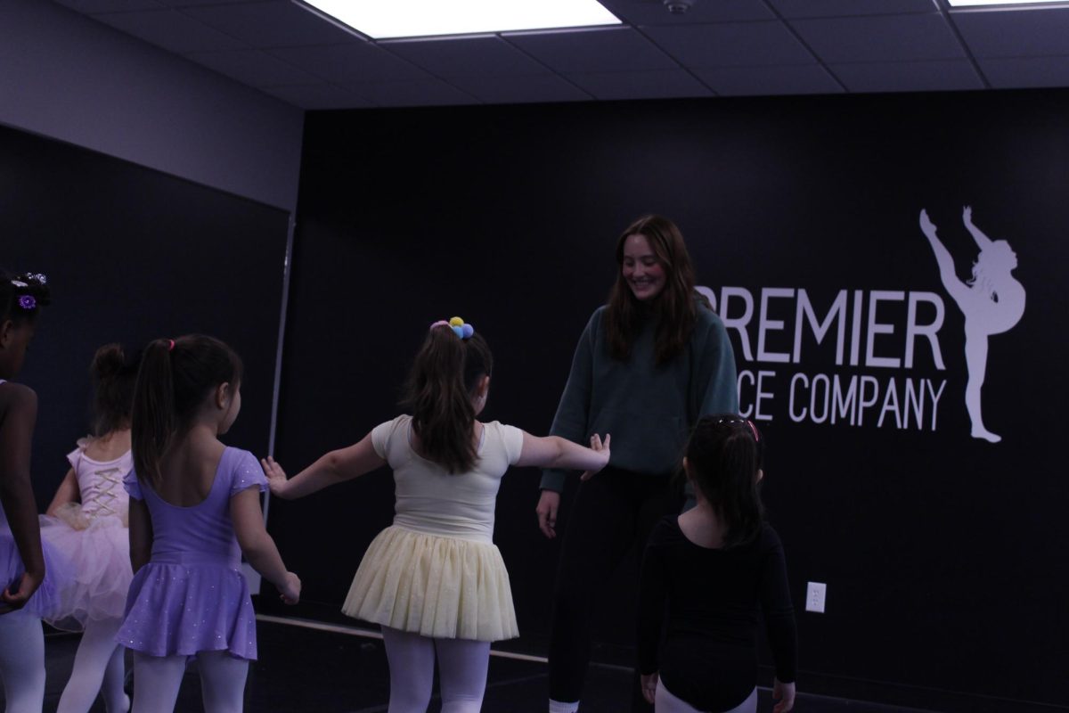  Anna Dean (11) instructs her tap ballet class to elementary school children at a studio in Premier Dance Company on April 11. Dean participated in the same type of classes at the age of 2. 