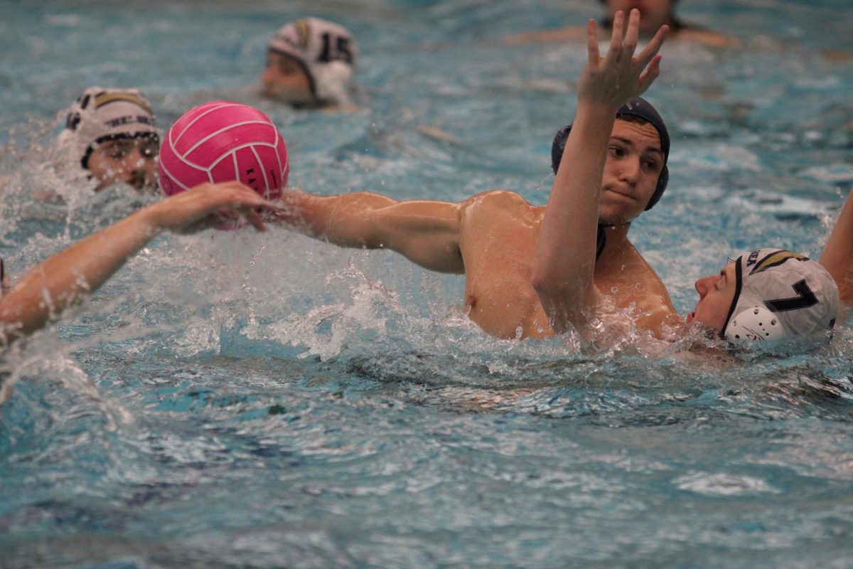 Jonah Robertson (11) shoots the ball in their game against Mason on Sep.
20. 