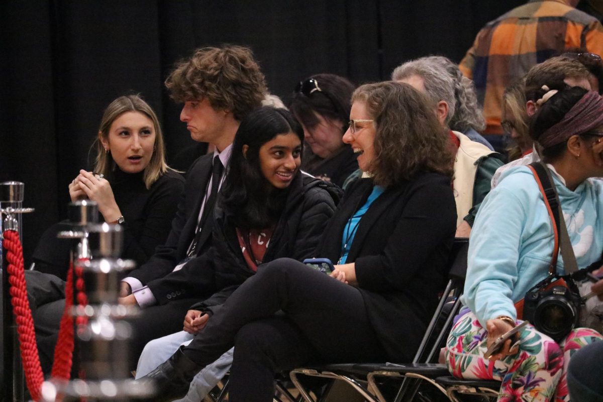 (Left to right) Emma Grundhauser, Noah Purdy, Reena Natla (12) and Julia
Finley sitting at an Elissa Slotkin re-election rally on Nov. 1, 2023. Natla
and Finley discussed how interesting it was for Slotkin to be collaborating
with Liz Cheney.