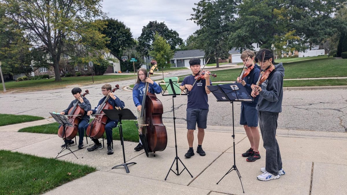 During the band and orchestra’s Night Out fundraiser, orchestra members Tristan Lee (10), Joseph Barger (10), Henry Halbisen (10), Guhyun Jeong (12), David Barger (12), Newman Liao (10) perform for households in the Whitehills neighborhood on Sep. 29. The organization raised over $14,000 in the fundraiser, which covers operating costs for the programs.