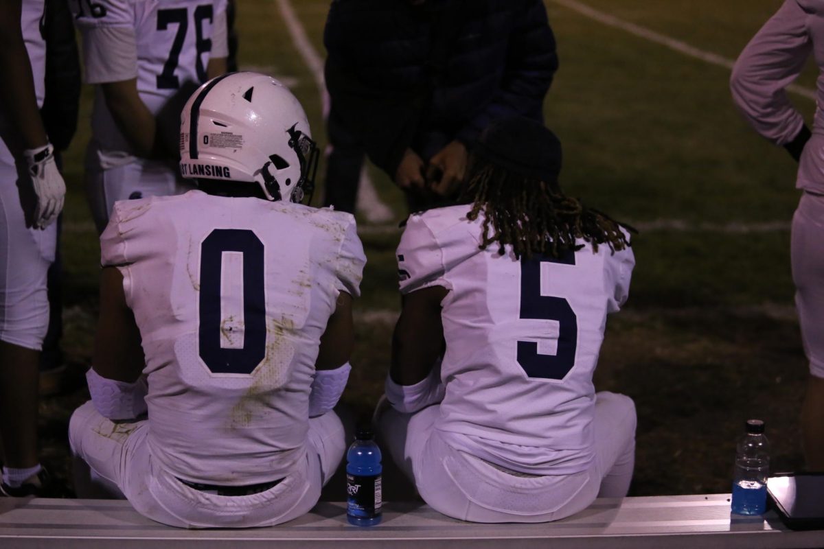 Talking after getting a touchdown at the EL Vs. Holt football game on Oct. 26. Jace Clarizio (12) (Left) and Dwataye Sams Jr. (12) (Right).