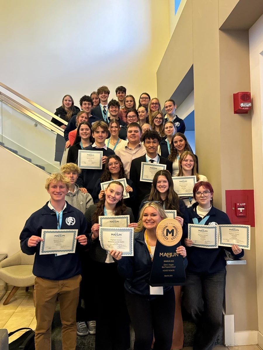 Model UN poses for a picture at the Mid-American Model United Nations conference in March 2025 after winning "Best prepared school".