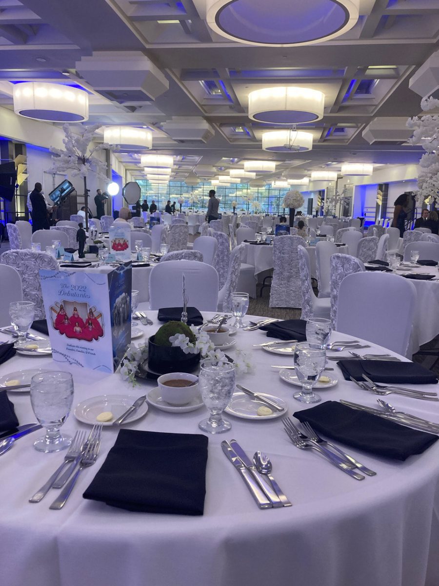 A preparation dinner held by Le Meres et Debutantes at the Kellogg center during Apr. 2021. serving tea and wearing their finest attire the debutantes dine. Courtesy photo.