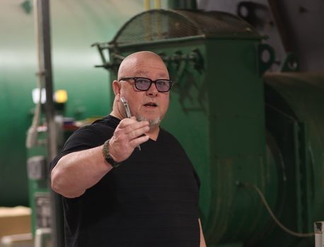 Billy Hastings, Director of Facilities and Operations, guides students around the boiler room. him and his team ready for any inspections.