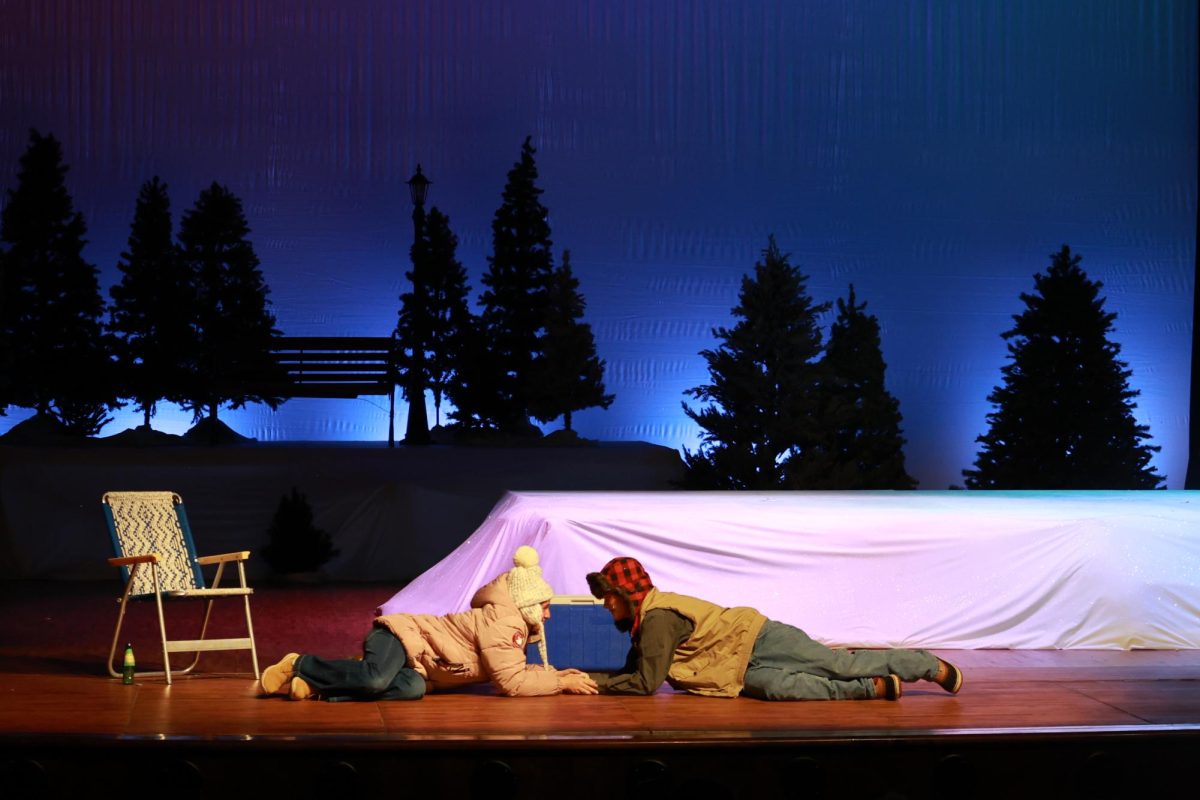 Falling on stage together, Addi Montgomery (10), who plays Shelly, and Luca Lommatzsch (10), who plays Deena, non-figuratively fall for each other on stage after realizing their feelings for each other during the show's opening night on Thursday, Nov 13.
