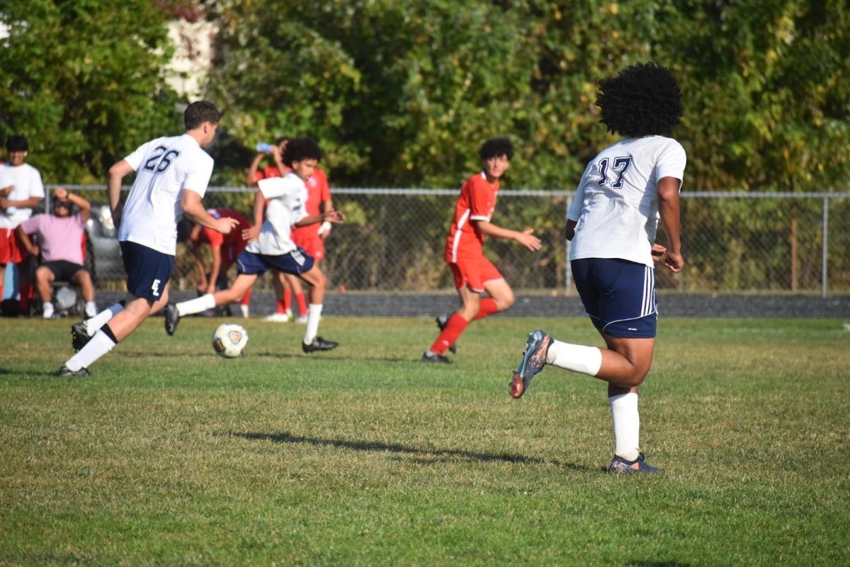 Running with the ball, Nicolas Cattani (10) plays in the boys JV soccer game against Everett on Sep. 18 at Everett High School. Coming from Marau, Brazil, this is Cattani's first year on the team. 