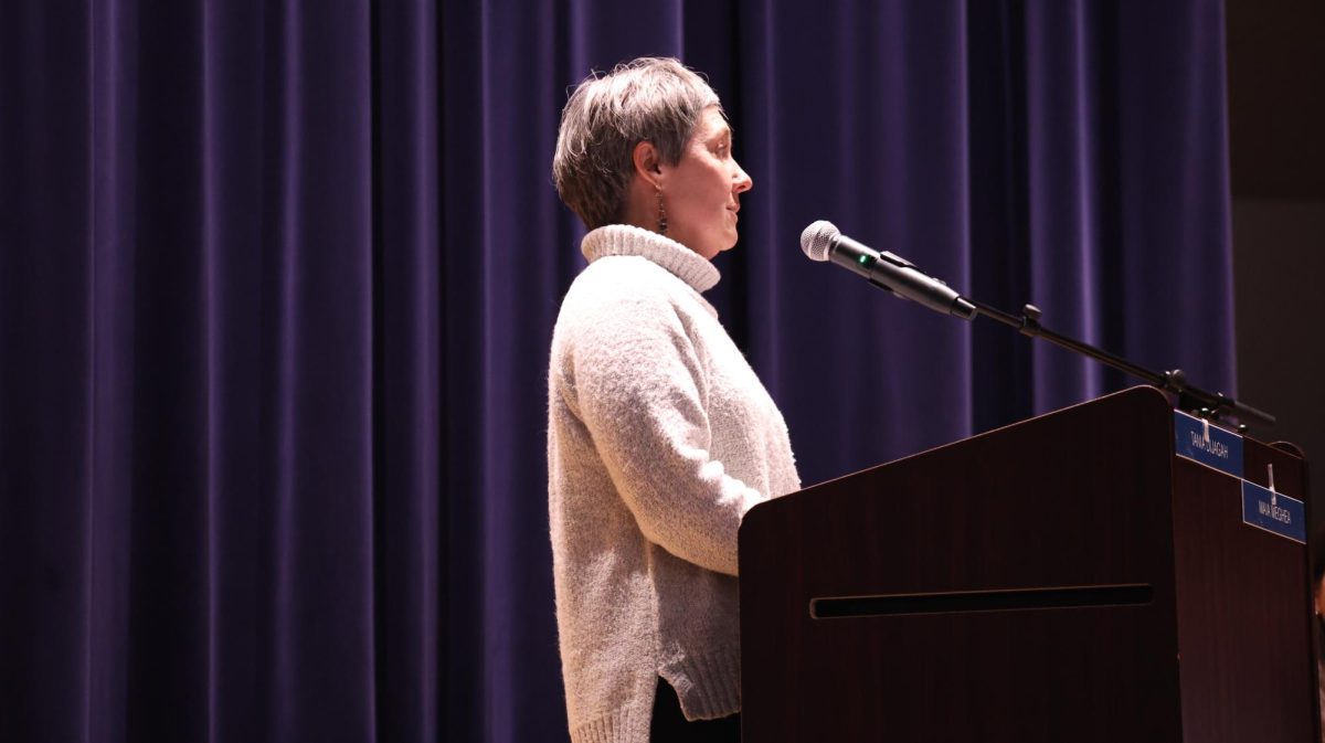 Speaking at the Dec. 8 school board meeting, Anne Scott advocates for the new sex-ed curriculum to be approved. Created by a committee of teachers and advisors, the update included new information on STIs and other health-related topics.